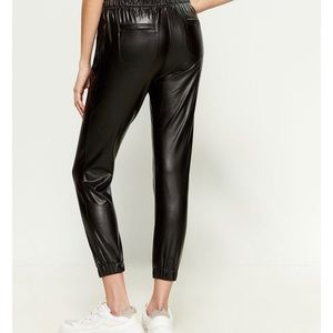 David learned black leather jogger